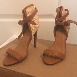 A pair of tan and off white heels!!